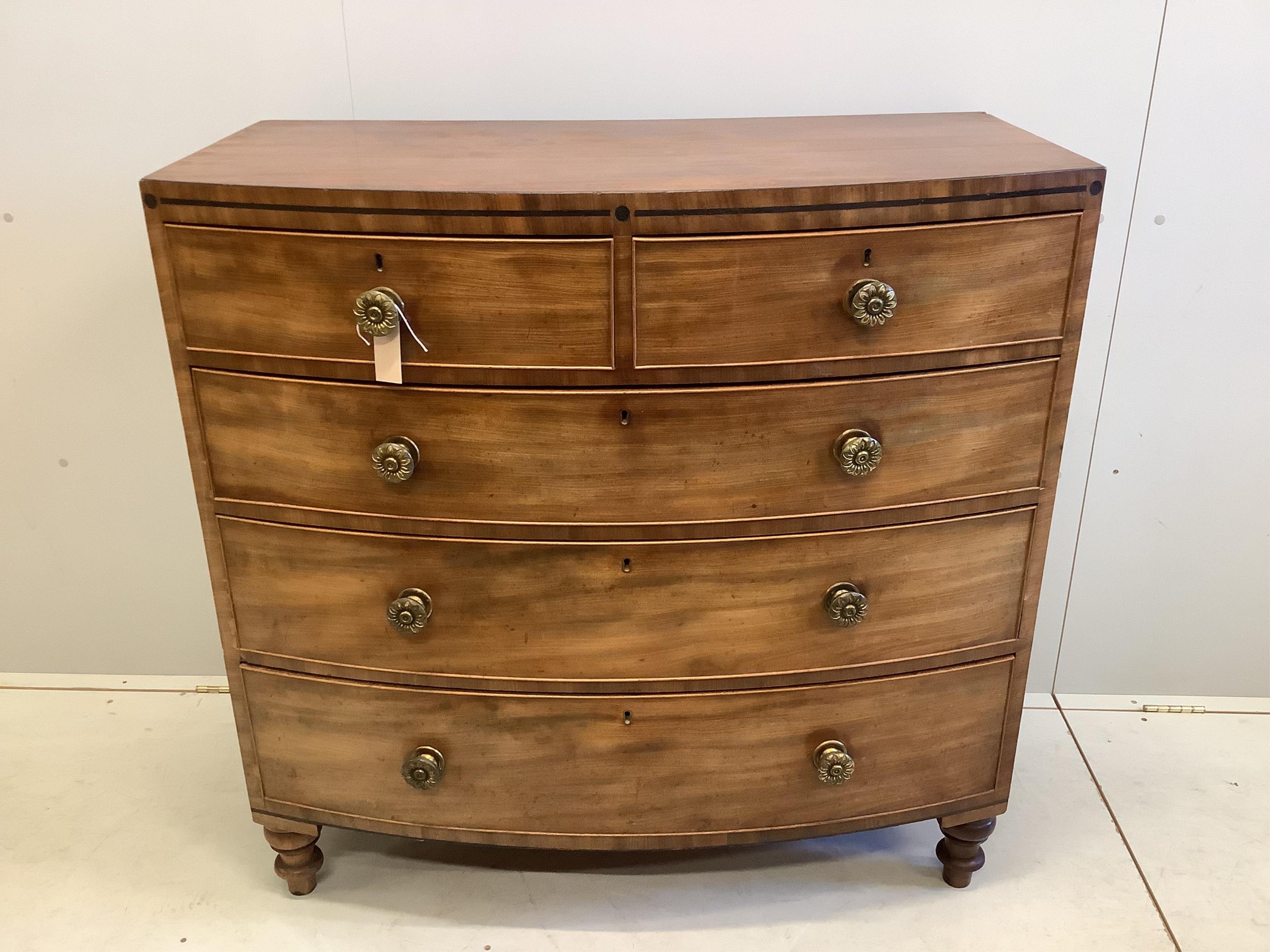 A Regency ebony strung mahogany bowfront chest, width 107cm, depth 56cm, height 106cm